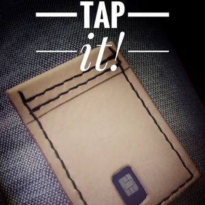 Minimalist wallet with “tap” feature